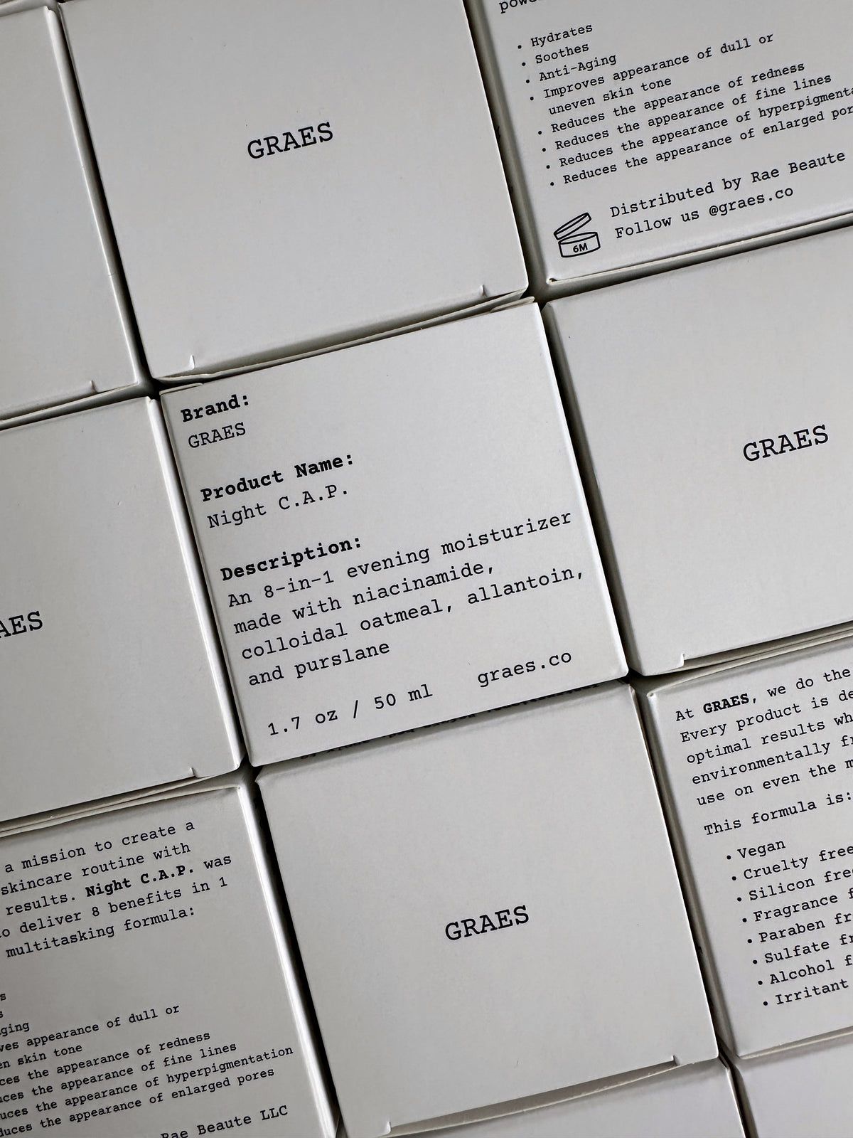 Close-up of GRAES product packaging with text on a white background